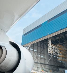 Plane engine coming out of hanger - Aviation and Aerospace Insurance - Howden Belgium