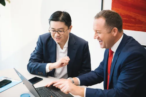 Howden Employees Smiling and Working - Howden Belgium