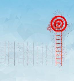 White ladders lined up in a row, with one red ladder topped by a red target