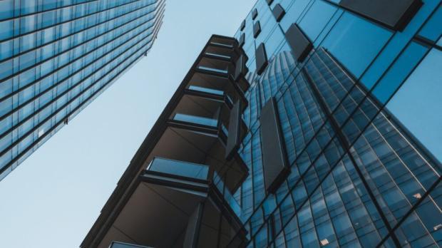corporate building talk office with glass windows reflecting the opposite building