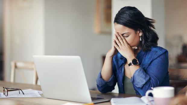 Stressed lady after making error in business