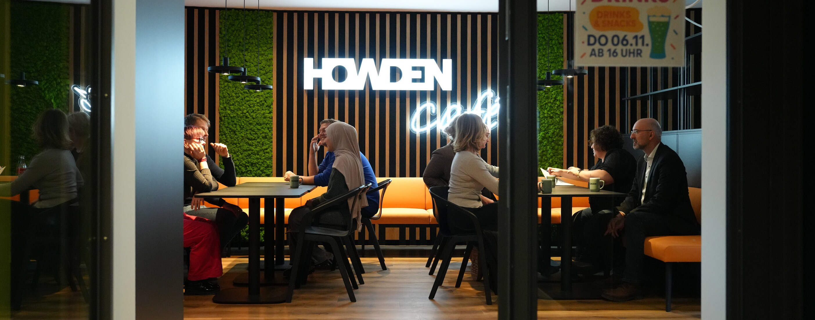 Howden employees sitting in a Howden Cafe