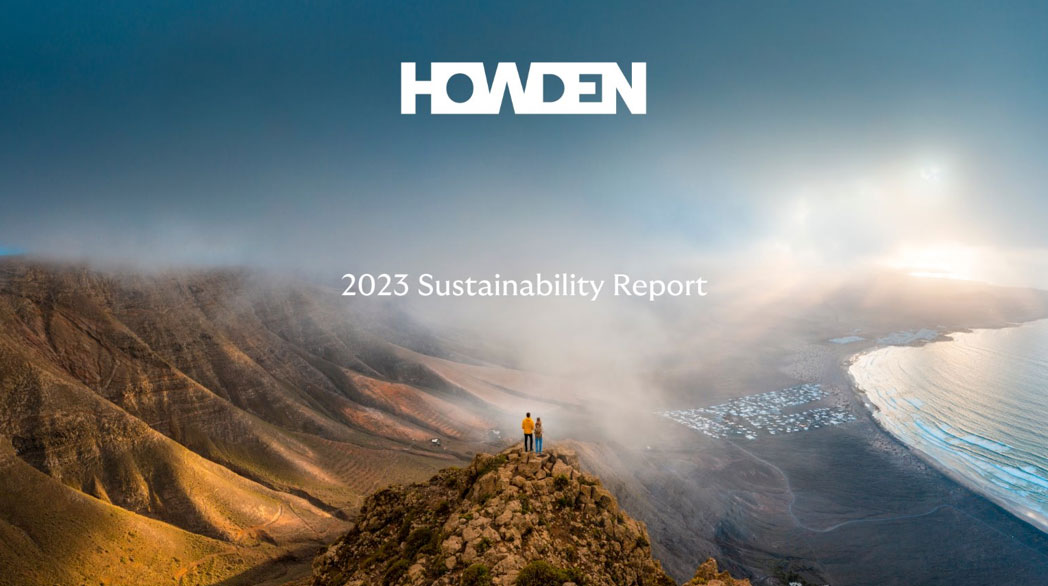 The cover of Howden's 2023 sustainability report, a panoramic image of a canyon with two people standing atop a cliff