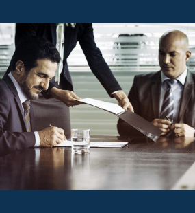 businessmen sitting around table