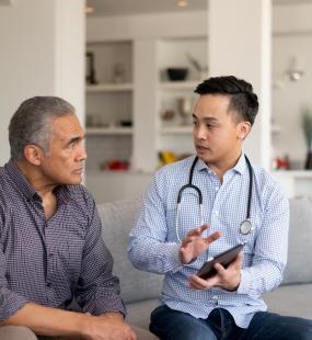 Doctor giving patient his prognosis