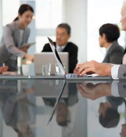 Directors and officers at a board meeting