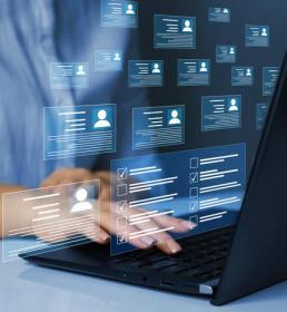 rendered stat images above laptop