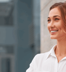 Woman leaning against wall