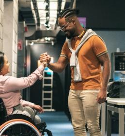 two people engaging in a handshake