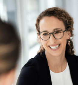 Person smiling at another person