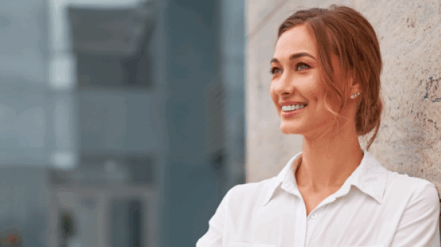 Woman leaning against wall
