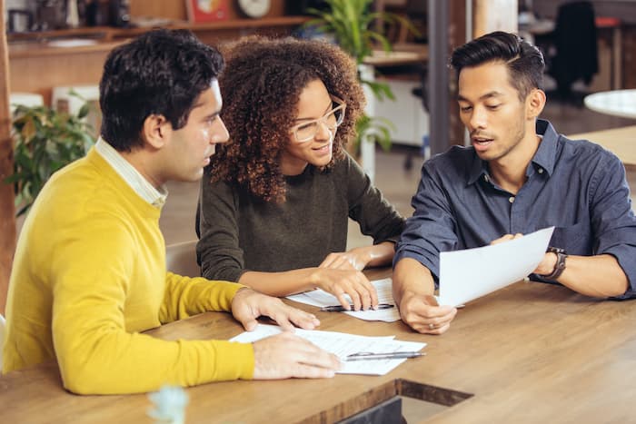 staff meeting around a table