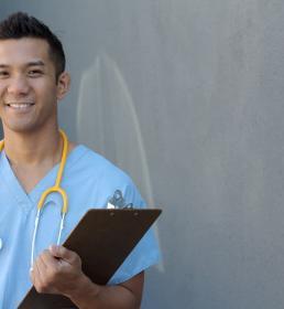 Smiling young male doctor