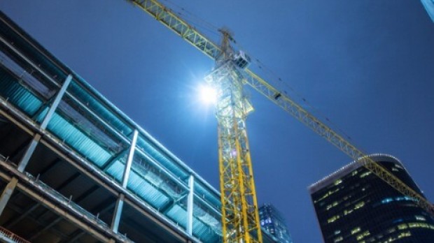 Building under construction with crane Building under construction with crane