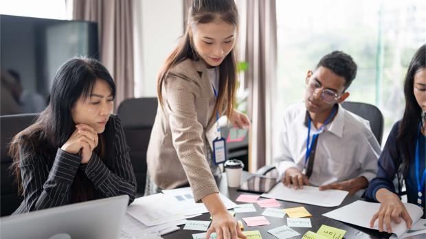 Multiracial Asian colleagues in the office Multiracial Asian colleagues in the office