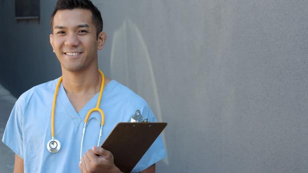 Smiling young male doctor