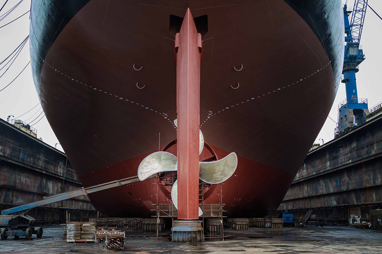 Rear of a large ship in a dry dock